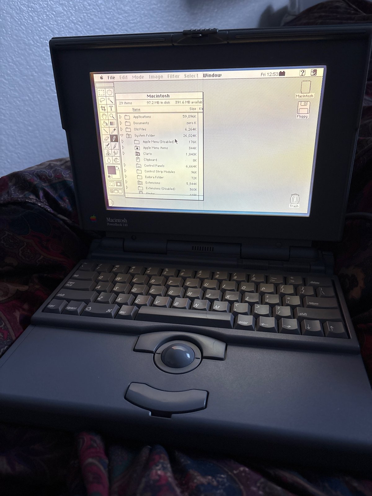 Applications open on the PowerBook 140.