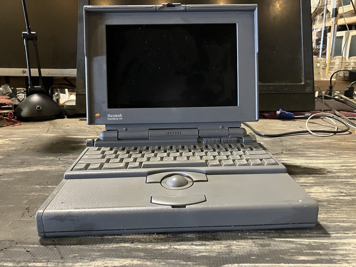 The PowerBook 140 with its built-in keyboard and trackball.